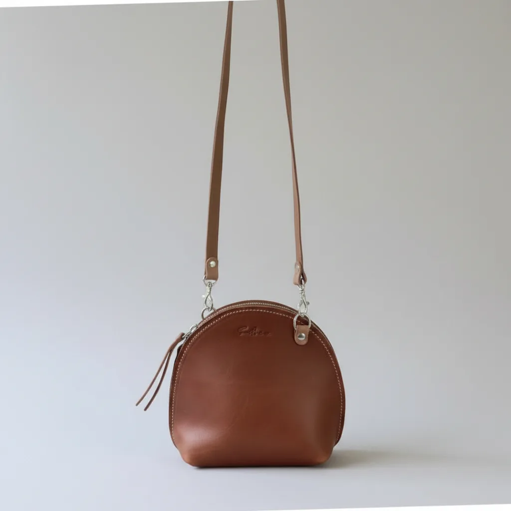 Arc mini leather crossbody bag - Eco tan